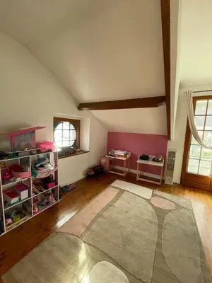 Un ou plusieurs lits dans un hébergement de l'établissement Maison 20 min de PARIS
