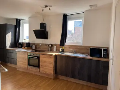Cuisine ou kitchenette dans l'établissement La Bulle d R