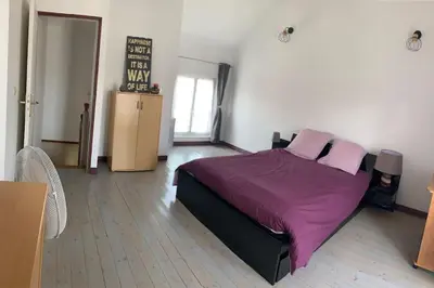 Un ou plusieurs lits dans un hébergement de l'établissement Petite maison à la campagne
