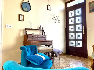 Coin salon dans l'établissement Gîte de la Chapelle