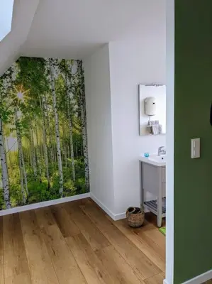 Télévision ou salle de divertissement dans l'établissement Studio neuf et cosy dans un écrin de nature