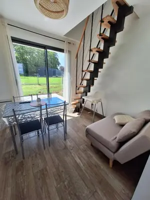 Coin salon dans l'établissement logement calme, 5 minutes de l'autoroute