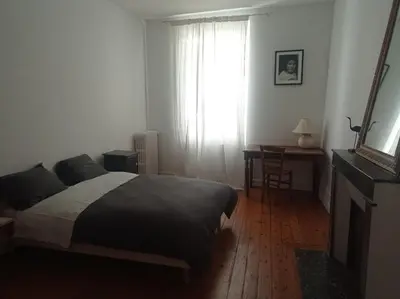 Un ou plusieurs lits dans un hébergement de l'établissement La maison de Nina