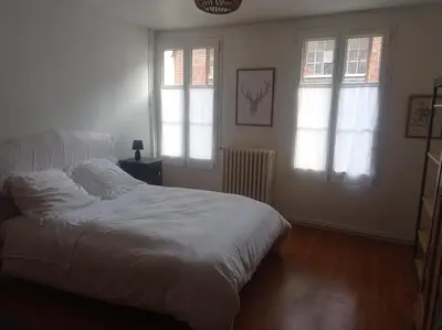 Un ou plusieurs lits dans un hébergement de l'établissement La maison de Nina