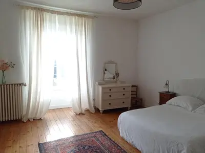 Un ou plusieurs lits dans un hébergement de l'établissement La maison de Nina