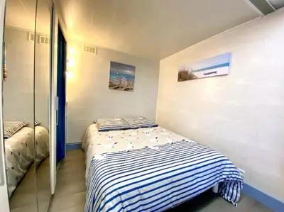 Un ou plusieurs lits dans un hébergement de l'établissement Le doux rivage plain-pied avec jardin et parking - Dog friendly - LABEL clés vacances