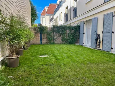 Jardin de l'établissement Modern family 3 bedroom apartment in the center of Maisons-Laffitte