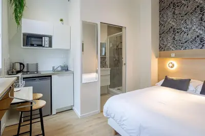Cuisine ou kitchenette dans l'établissement Appartement 3 proche de la gare et du centre ville