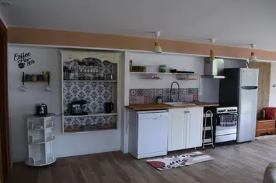 Cuisine ou kitchenette dans l'établissement Gîte du Levant 76