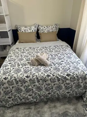 Un ou plusieurs lits dans un hébergement de l'établissement Appartement tout confort