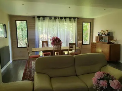 Coin salon dans l'établissement Cottage agréable et chaleureux