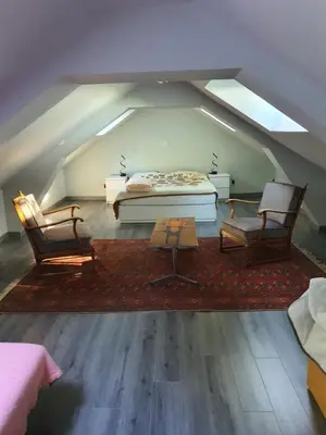 Coin salon dans l'établissement Cottage agréable et chaleureux