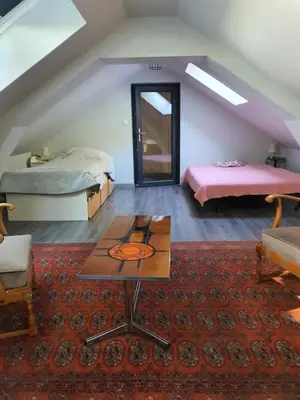 Un ou plusieurs lits dans un hébergement de l'établissement Cottage agréable et chaleureux