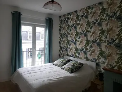 Un ou plusieurs lits dans un hébergement de l'établissement Appartement chez Virginie et Freddy