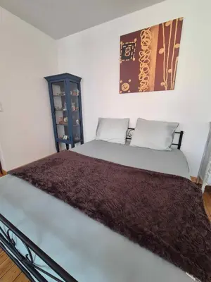 Un ou plusieurs lits dans un hébergement de l'établissement Sherlock Home