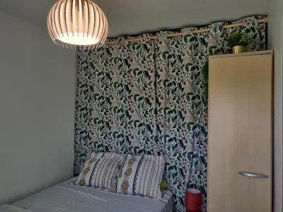 Un ou plusieurs lits dans un hébergement de l'établissement Studio cosy sans vis-à-vis
