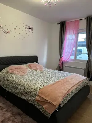 Un ou plusieurs lits dans un hébergement de l'établissement Maison de vacances