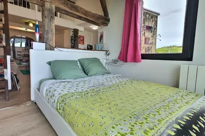 Un ou plusieurs lits dans un hébergement de l'établissement La Petite Eole - Déco 70's, Entre Rouen et Dieppe