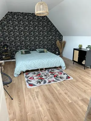 Un ou plusieurs lits dans un hébergement de l'établissement Le Nid des Voyageurs - chambre Eurylaime