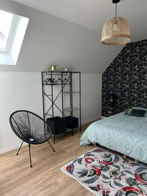 Un ou plusieurs lits dans un hébergement de l'établissement Le Nid des Voyageurs - chambre Eurylaime