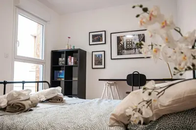 Un ou plusieurs lits dans un hébergement de l'établissement Maison de ville moderne en plein cœur de Rouen