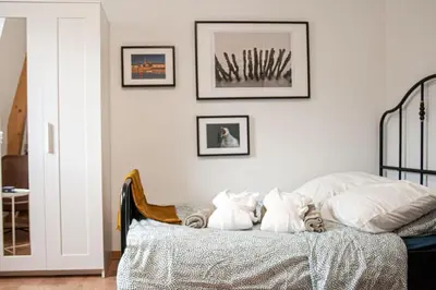 Un ou plusieurs lits dans un hébergement de l'établissement Maison de ville moderne en plein cœur de Rouen