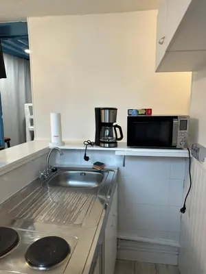 Cuisine ou kitchenette dans l'établissement Cocon Saint Ouen Rouen