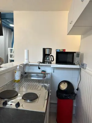 Cuisine ou kitchenette dans l'établissement Cocon Saint Ouen Rouen