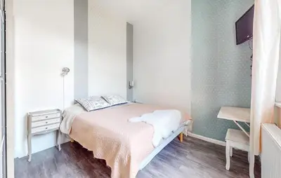 Un ou plusieurs lits dans un hébergement de l'établissement Awesome Home In Arques La Bataille
