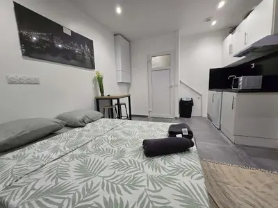 Cuisine ou kitchenette dans l'établissement 2 Studio Cosy Wifi a Meulan