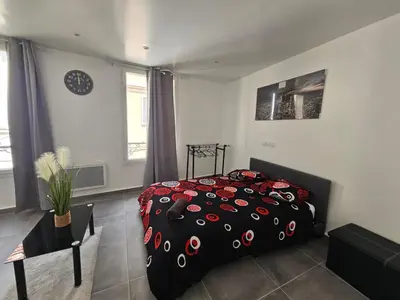 Un ou plusieurs lits dans un hébergement de l'établissement 1 Studio Cosy avec WIFI Meulan EN Y