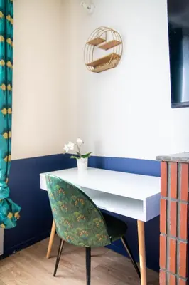 Télévision ou salle de divertissement dans l'établissement Appartement entier cosy