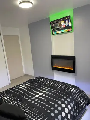 Un ou plusieurs lits dans un hébergement de l'établissement Appartement 3 pièces à 5 minutes de la gare de Creil