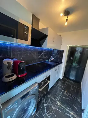 Cuisine ou kitchenette dans l'établissement Appartement 3 pièces à 5 minutes de la gare de Creil