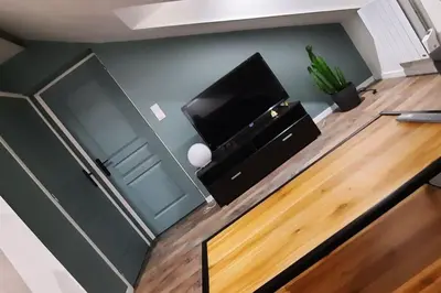 Télévision ou salle de divertissement dans l'établissement Appartement de charme centre ville