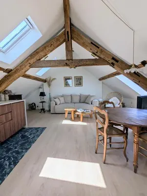 Coin salon dans l'établissement Chantilly sous les toits