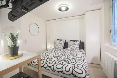 Un ou plusieurs lits dans un hébergement de l'établissement Charmant appartement en duplex au coeur de Rouen