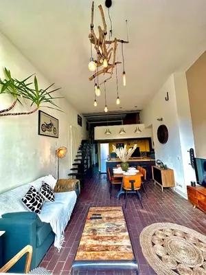 Coin salon dans l'établissement Le Loft Rouen Centre