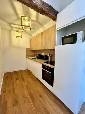 Cuisine ou kitchenette dans l'établissement Escale Doree