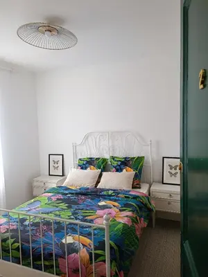 Un ou plusieurs lits dans un hébergement de l'établissement Chambres cosy au coeur du village