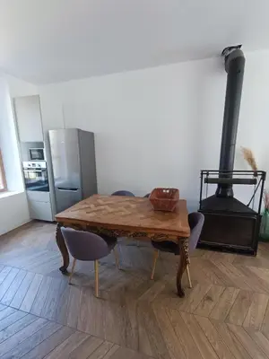 Cuisine ou kitchenette dans l'établissement Chambres cosy au coeur du village