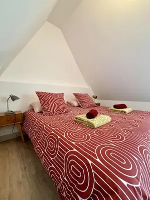 Un ou plusieurs lits dans un hébergement de l'établissement Le Charmant Au cœur de Dieppe 2ème étage 6 personnes