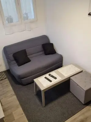 Coin salon dans l'établissement Charmant logement à Déville proche université
