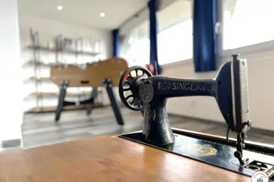 Un ou plusieurs lits dans un hébergement de l'établissement l'Olympe - Babyfoot Vidéoprojecteur & Parking