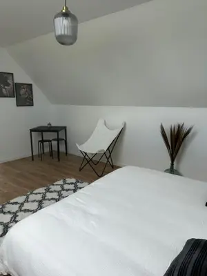 Un ou plusieurs lits dans un hébergement de l'établissement Le Nid des Voyageurs - Chambre Paruline