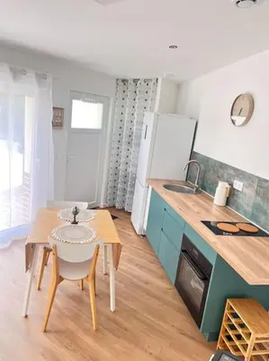 Cuisine ou kitchenette dans l'établissement La belle Iris