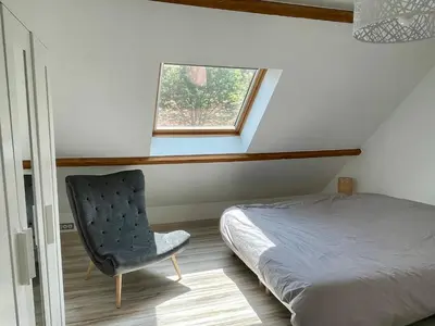 Un ou plusieurs lits dans un hébergement de l'établissement Maison Côte Et Champs