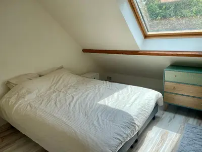 Un ou plusieurs lits dans un hébergement de l'établissement Maison Côte Et Champs
