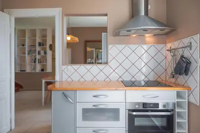 Cuisine ou kitchenette dans l'établissement La Baronnerie Normande - Piscine et jacuzzi