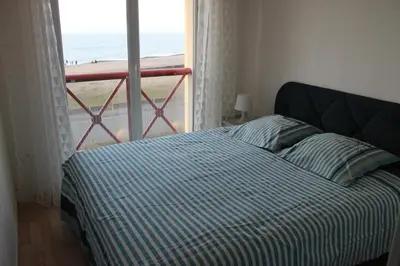 Un ou plusieurs lits dans un hébergement de l'établissement MAGNIFIQUE APPARTEMENT et AVEC VUE SUR MER
